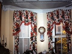 Gathered with jabot like sides