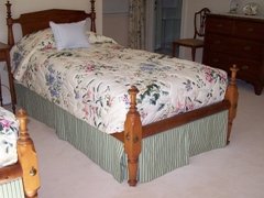 Outline quilted coverlet