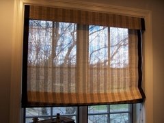 Natural woven wood trimmed in black